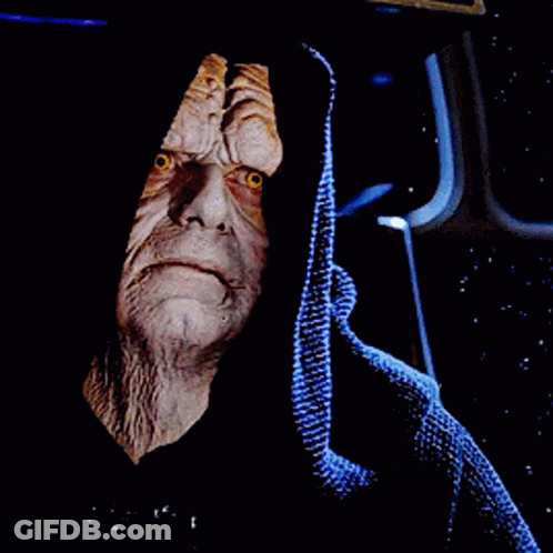 A Close Up Of A Star Wars Character With A Hood GIF