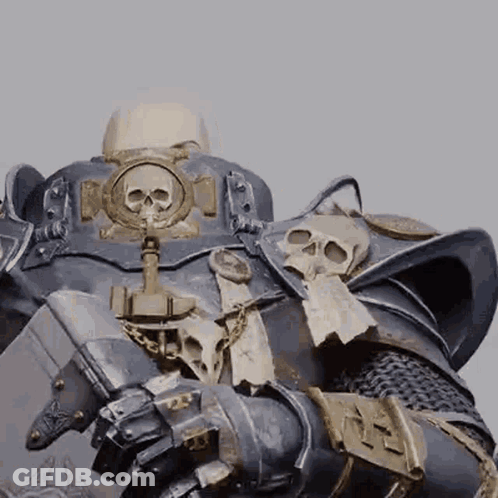 A Close Up Of A Statue Of A Knight With Skulls On His Armor GIF