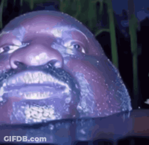 Close Up Of Man's Face Statue GIF