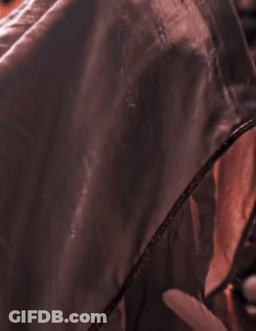 Close Up Of Man's Face With White Hat Statue GIF