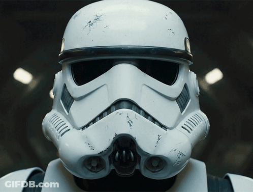 A Close Up Of A Storm Trooper Helmet With A Black Stripe GIF
