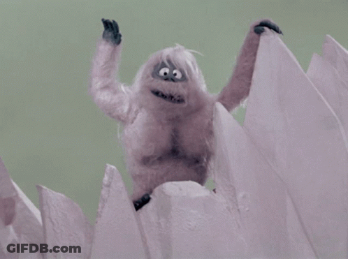 A Close Up Of A Stuffed Animal With A Big Smile On Its Face GIF