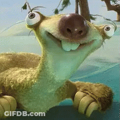 A Close Up Of A Stuffed Animal With Big Eyes And A Smile On Its Face GIF