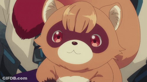 A Close Up Of A Stuffed Animal With Red Eyes And A White Nose GIF