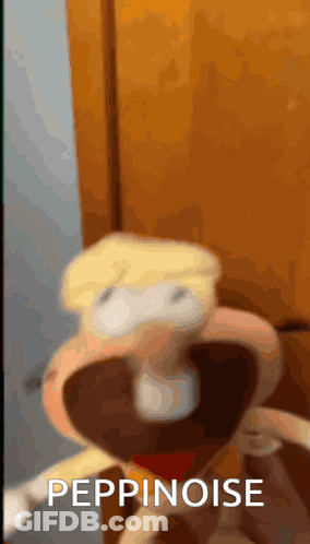 A Close Up Of A Stuffed Animal With The Words Peppinoise Written Below It GIF