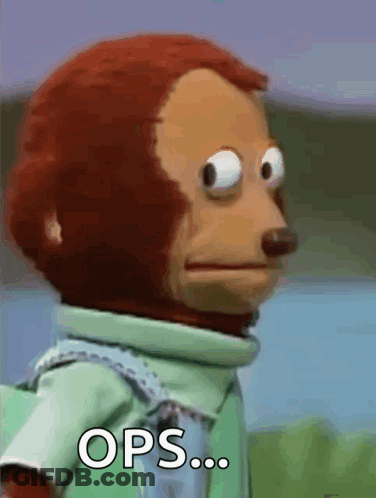 A Close Up Of A Stuffed Monkey With The Words Ops Written On It GIF