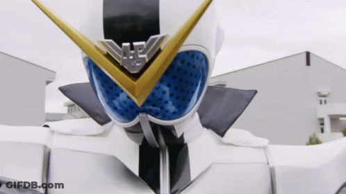 A Close Up Of A Superhero 'S Face With A Blue And Gold Emblem On It GIF