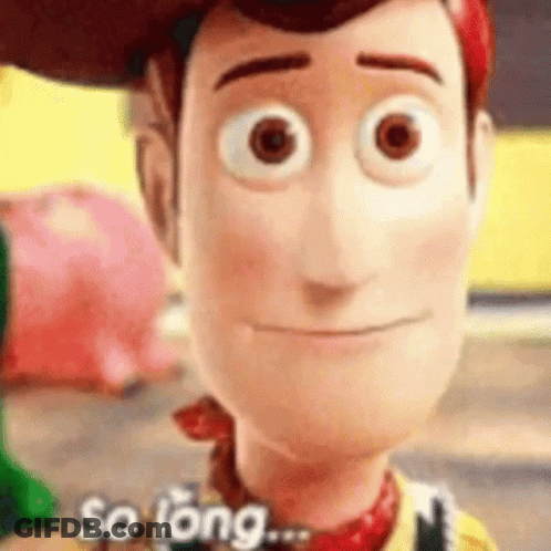 A Close Up Of A Toy Story Woody Doll 'S Face . GIF