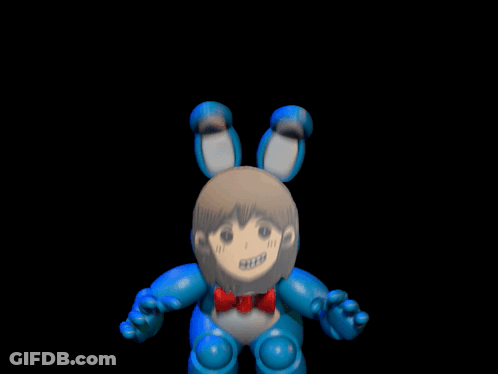 A Close Up Of A Toy With A Drawing Of A Girl 'S Face On It GIF