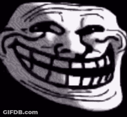 A Close Up Of A Troll Face With A Big Smile On It . GIF