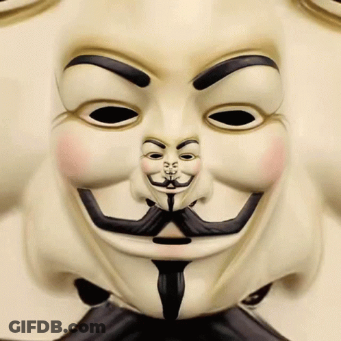 A Close Up Of A V For Vendetta Mask With A Mustache And Eyebrows GIF