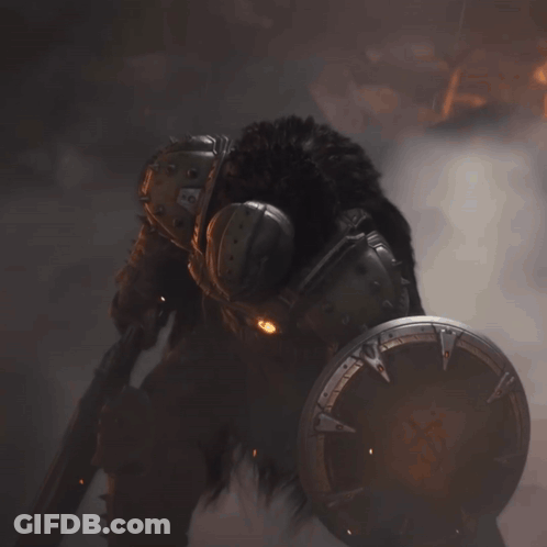A Close Up Of A Video Game Character 'S Helmet And Armor With The Letters Aa On It GIF