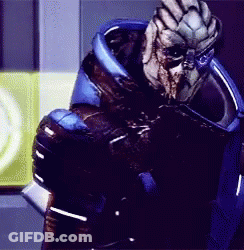 A Close Up Of A Video Game Character With A Blue Helmet GIF