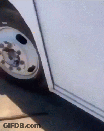 A Close Up Of A Wheel On A Vehicle GIF