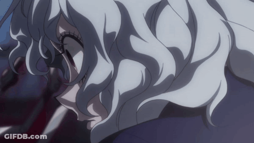 A Close Up Of A White Haired Anime Character GIF