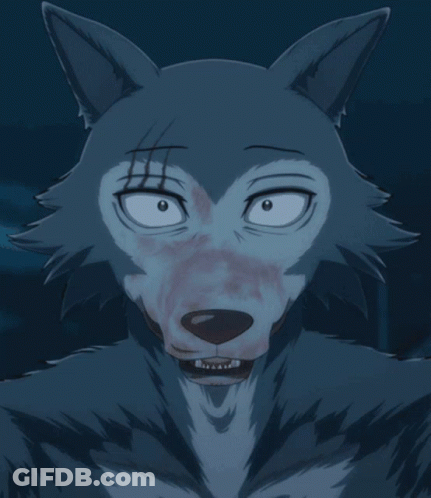 A Close Up Of A Wolf 'S Face With Blood On It 'S Face GIF