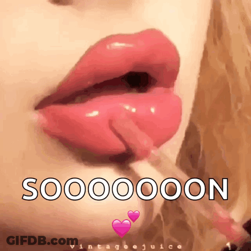 A Close Up Of A Woman Applying Lip Gloss With The Words Sooooooon Written On The Bottom GIF