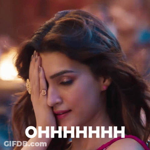 A Close Up Of A Woman Covering Her Face With Her Hand And The Words Ohhhhhhh Written On The Bottom GIF