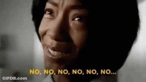 A Close Up Of A Woman Crying And Saying No . GIF