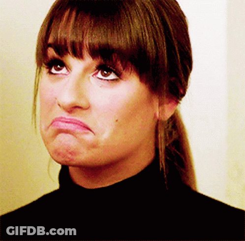 A Close Up Of A Woman Making A Face GIF