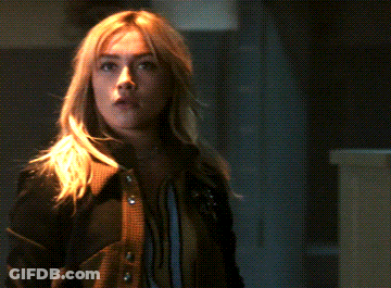 A Close Up Of A Woman Making A Funny Face GIF