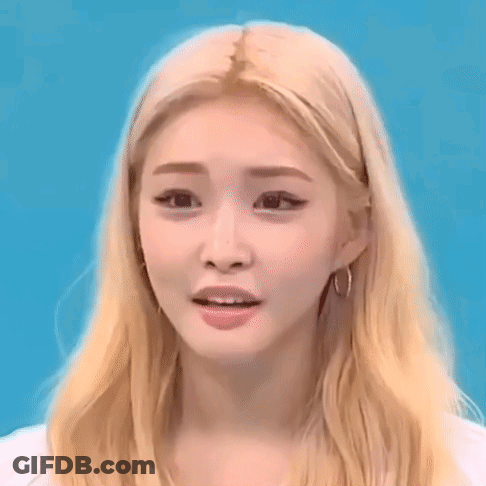 A Close Up Of A Woman Making A Funny Face . GIF