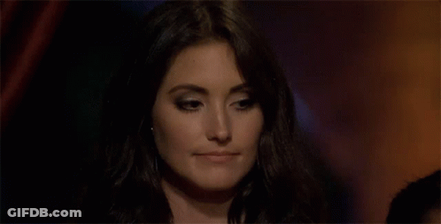 A Close Up Of A Woman Making A Funny Face . GIF