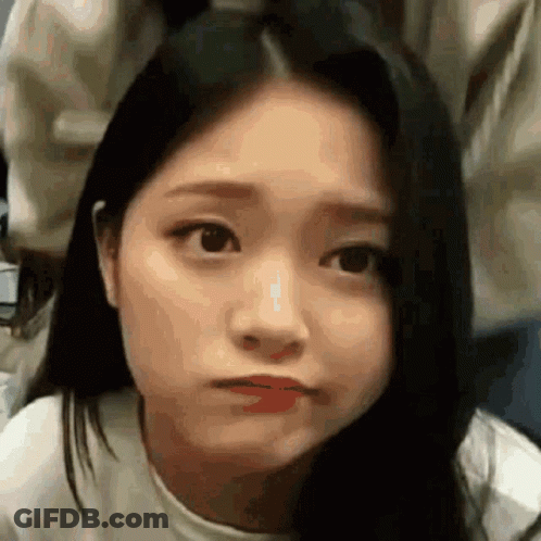 A Close Up Of A Woman Making A Funny Face With Her Mouth Open . GIF