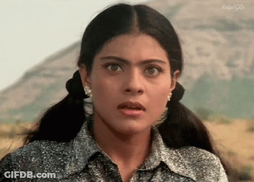 A Close Up Of A Woman Making A Surprised Face . GIF