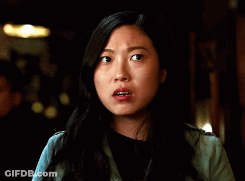 A Close Up Of A Woman Making A Surprised Face . GIF
