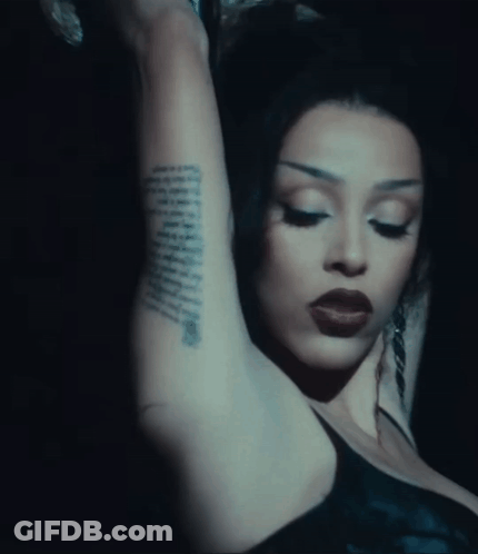 A Close Up Of A Woman 'S Arm With A Tattoo That Says ' I Love You ' On It GIF