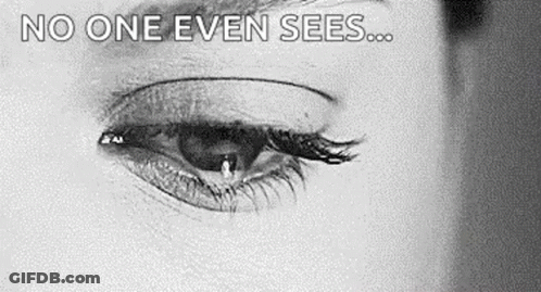 A Close Up Of A Woman 'S Eye With A Tear Coming Out Of It And The Words `` No One Even Sees '' . GIF