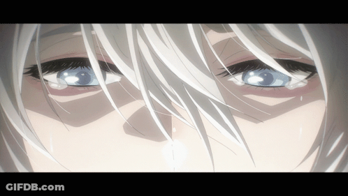 A Close Up Of A Woman 'S Eyes With White Hair GIF