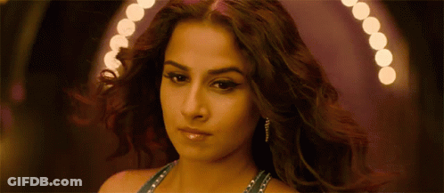 A Close Up Of A Woman 'S Face And Hair GIF