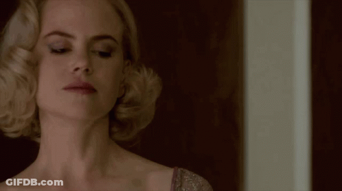 A Close Up Of A Woman 'S Face And Neck GIF