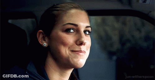 A Close Up Of A Woman 'S Face In A Car . GIF