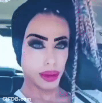 A Close Up Of A Woman 'S Face In A Car With Braids GIF