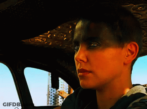A Close Up Of A Woman 'S Face In A Car With Her Eyes Closed GIF