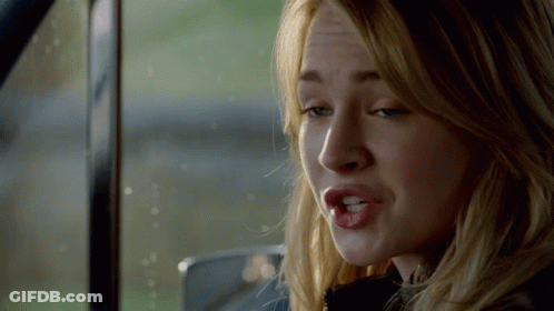Woman's Face Close Up In Car With Open Mouth GIF