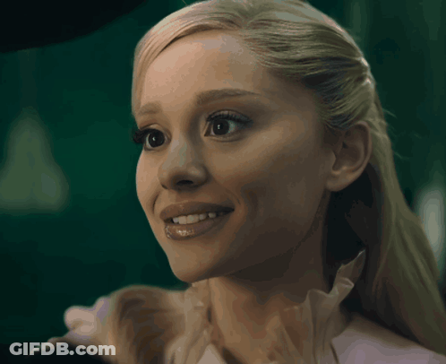 A Close Up Of A Woman 'S Face Smiling GIF