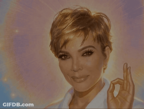 A Close Up Of A Woman 'S Face Smiling With Her Hand On Her Chin GIF