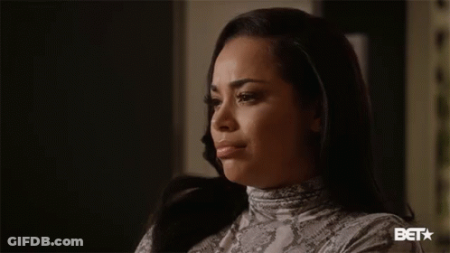 A Close Up Of A Woman 'S Face With A Bet Logo On The Bottom GIF