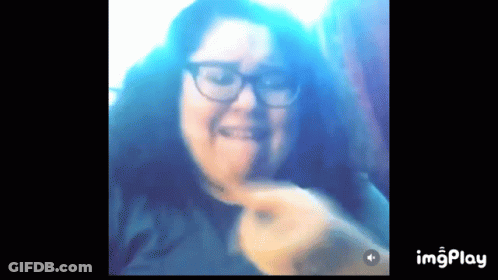 A Close Up Of A Woman 'S Face With A Blue Background And The Words Imgplay Below It GIF