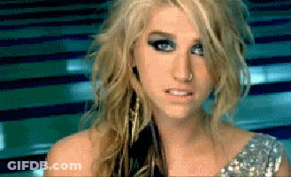 A Close Up Of A Woman 'S Face With A Blue Background GIF