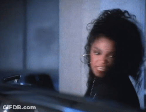 A Close Up Of A Woman 'S Face With A Blurred Background GIF
