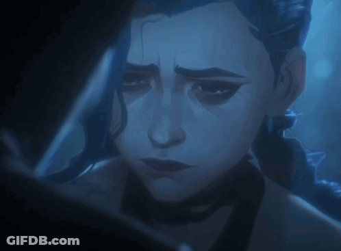 A Close Up Of A Woman 'S Face With A Dark Background GIF