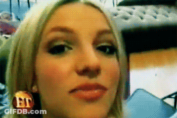 Close Up Of Woman's Face With ET Logo GIF