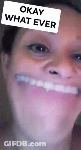 A Close Up Of A Woman 'S Face With A Filter That Says Okay What Ever On It . GIF