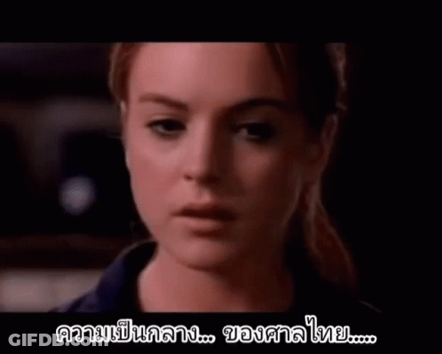 A Close Up Of A Woman 'S Face With A Foreign Language Written On The Bottom . GIF