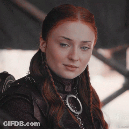 A Close Up Of A Woman 'S Face With A G-Sand Watermark GIF